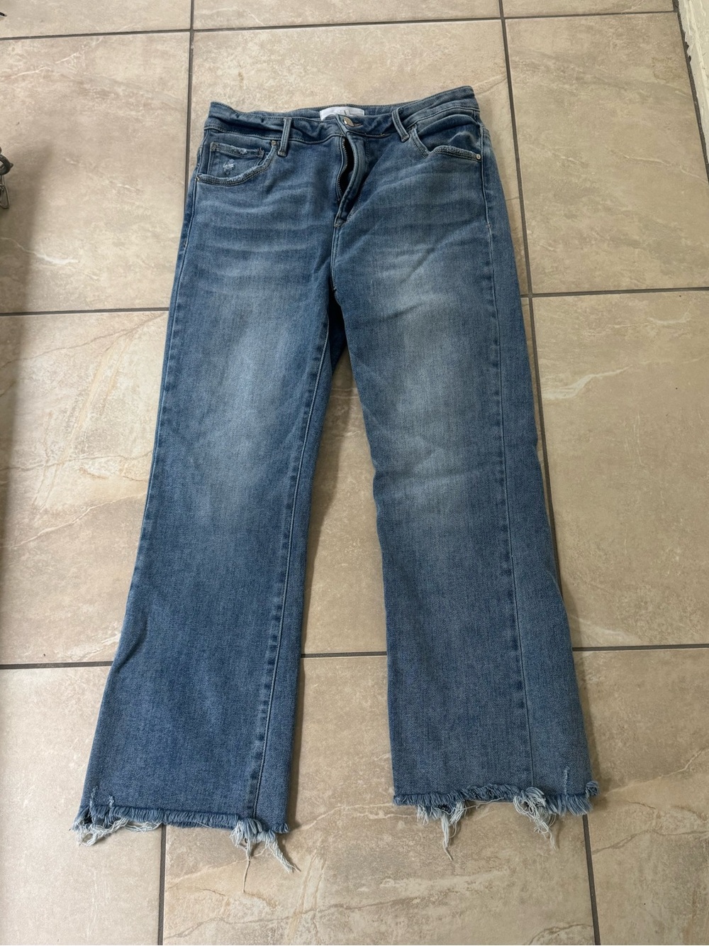 Womenโs cropped wide leg Risen jeans